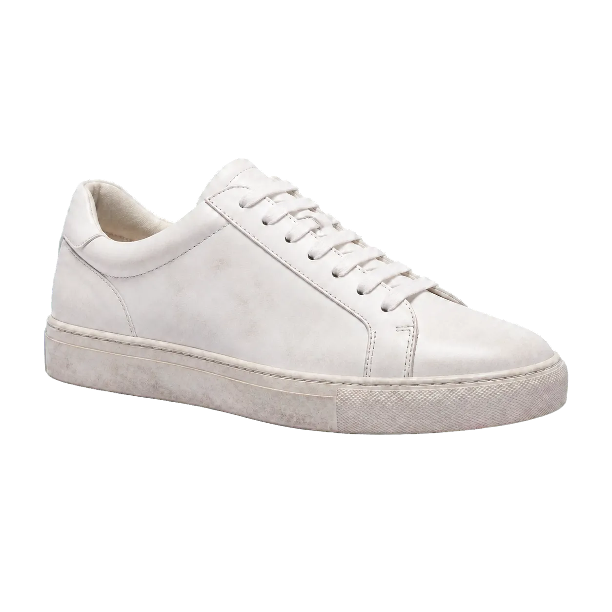 Tenis blanco de piel con suciedad superficial antes de una demostración de CERO CLEAN
